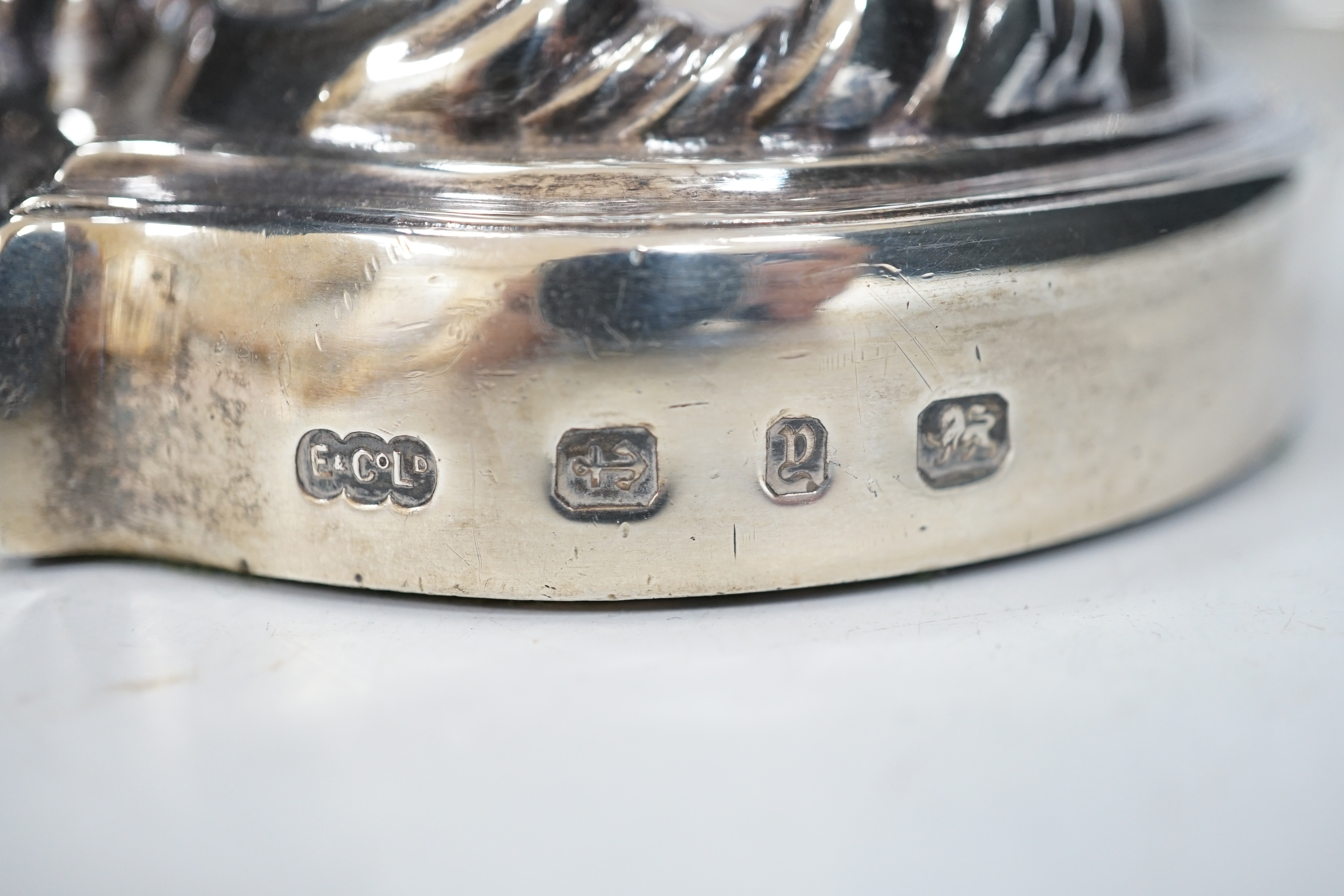 A good pair of late Victorian Elkington & Co. silver twin branch, three light candelabra